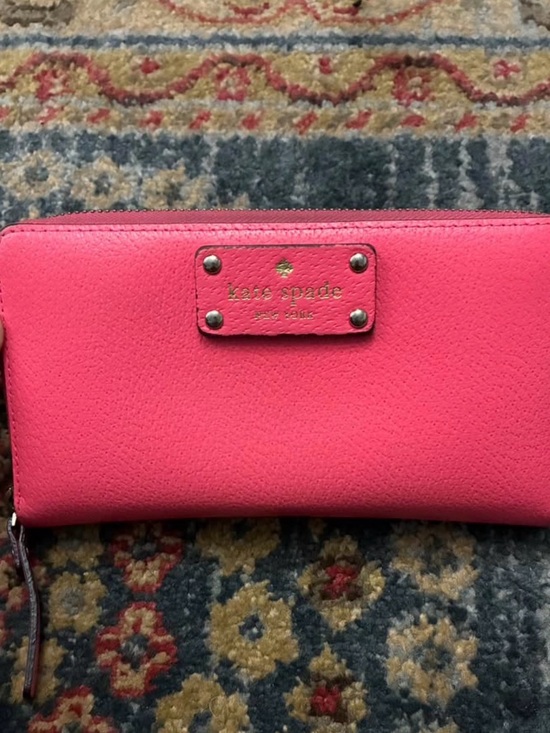 kate spade Handbags - Kate spade bright pink zip-around leather wallet